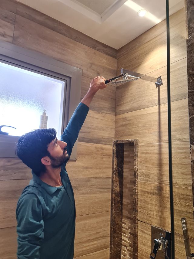 Rain shower, basin and toilet fitted
