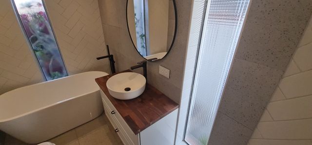 Bathroom with a freestanding bath