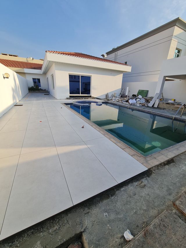Large tiles along a lap pool