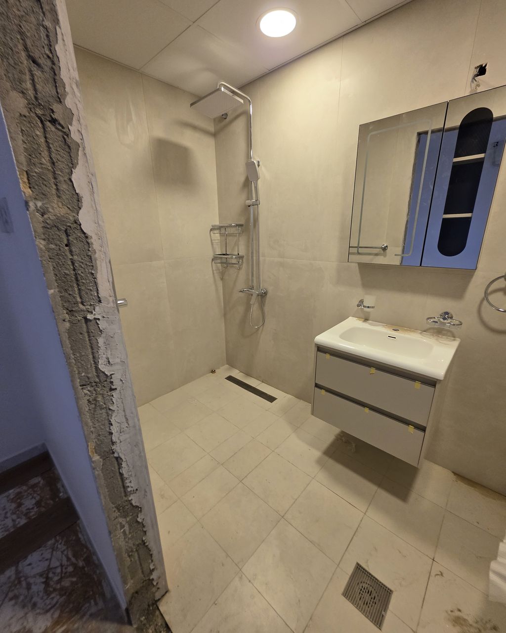 Before: Bathroom finished with a glass shower