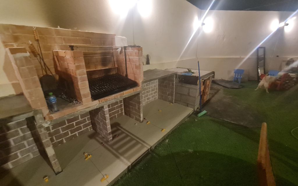 After: Outdoor BBQ and worktops built