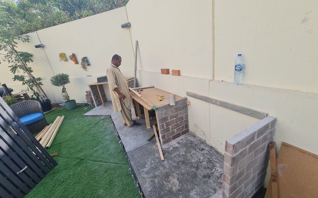 Before: Outdoor BBQ and worktops built