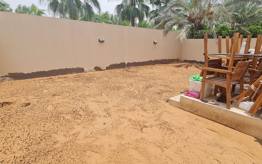 Before: Sandy garden turned into a lawn