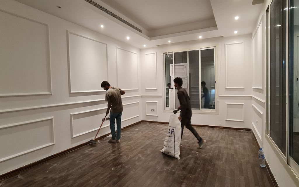 After: Living room panelled, painted and refloored