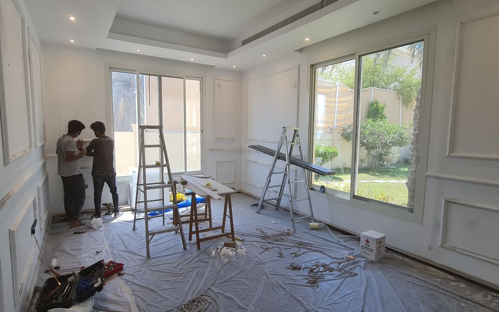Before: Living room panelled, painted and refloored