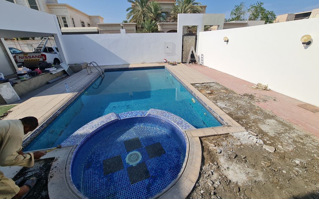 Before: Pool deck and garden rebuilt