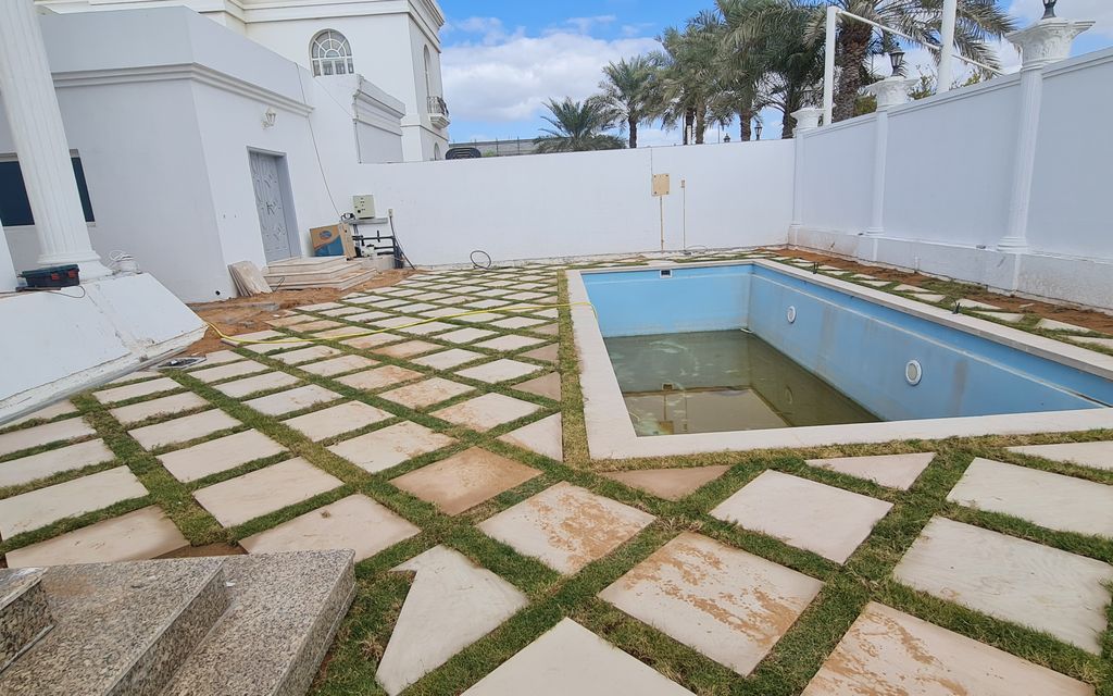 After: Pool terrace paved with grass joints