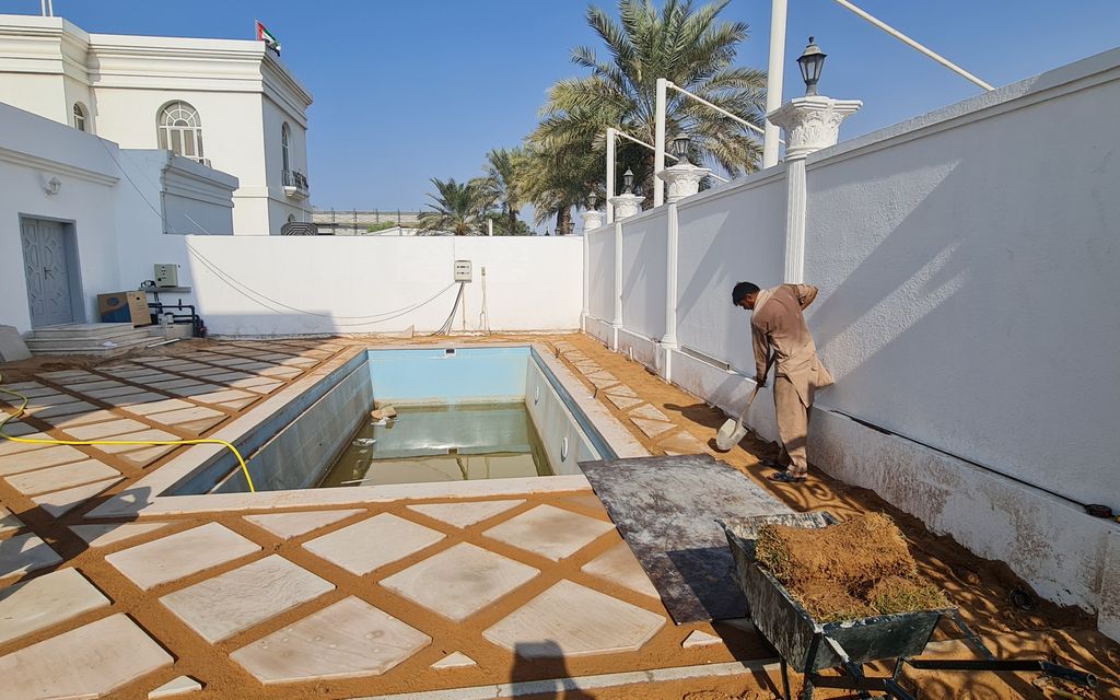 Before: Pool terrace paved with grass joints